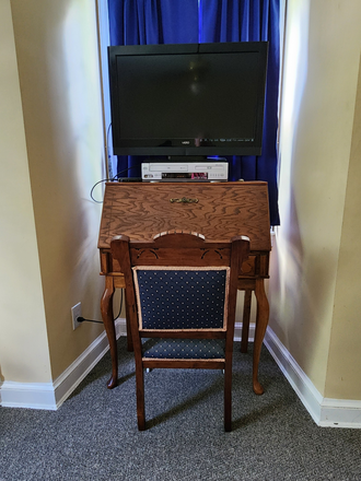 Desk and flat-screen TV - 4001 Queensbury Road Hyattsville