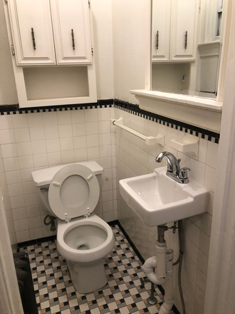 Bathroom Toilet & Sink - Apartment in the Heart of Brown's Campus