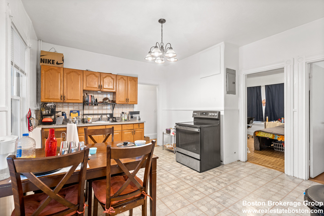 kitchen - Sunny and spacious 4 bedroom 1 bath located centrally in the heart of Mission Hill Apartments