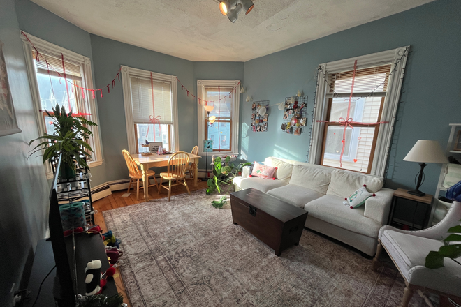 Living Room - Three Bedroom apartment with Large bathroom, private deck and laundry in building.