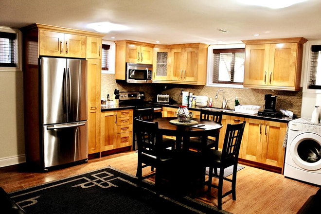 Kitchen View_1 - Private self-contained,  fully furnished 1-bedroom apt. Includes kitchen and laundry facilities