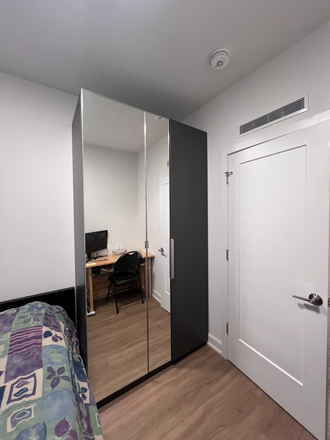 Bedroom #1 - Newly Renovated Rooms in One of Toronto's Best Locations! Bloor & Bathurst from $1,000/month—Book Apartments