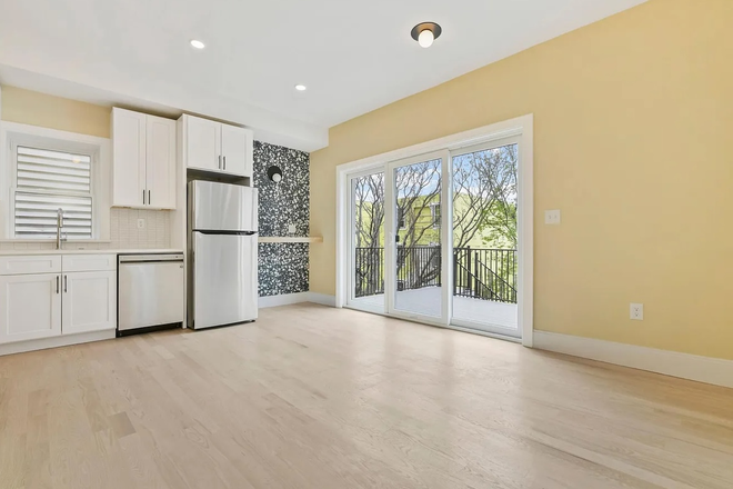 Living room/Kitchen/Deck - Sublet needed for 1 bedroom in 3bed/2ba in East Boston!