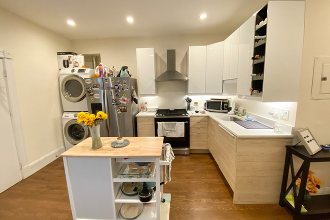 Kitchen - Modern 3 bedroom with yard, dishwasher, laundry in unit & more!