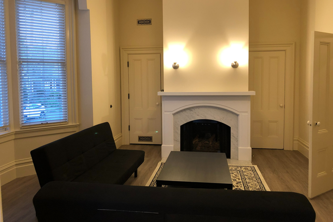 living room + fireplace - Available Jan1: to fill 1 room+shared full bath in Gated House, close to campus (3Bed/2Bath)