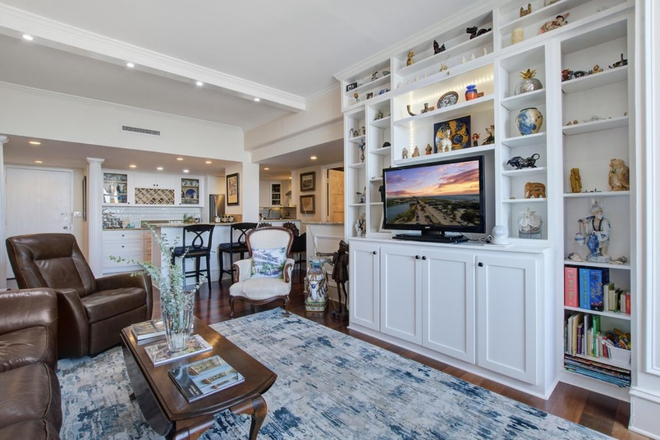 Living room - Stunning 10th-Floor Condo with Breathtaking Ashley River, Marina Views & Across from MUSC