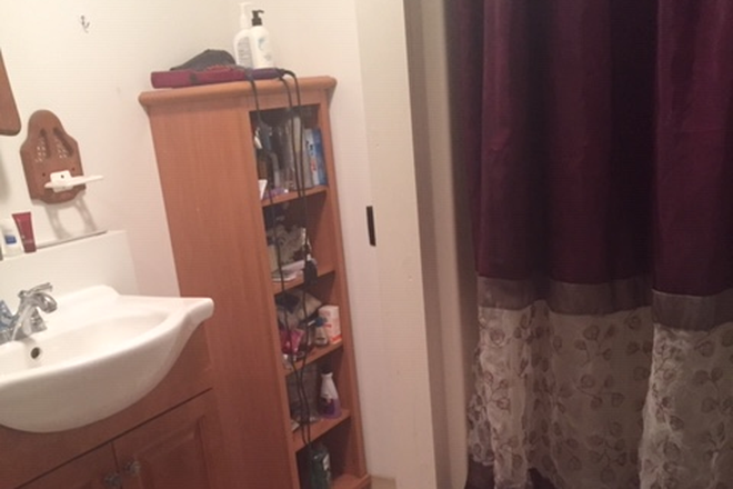 Bathroom with shower. - Finished Basement with private entrance, kitchen, bathroom, and 1 bedroom. House