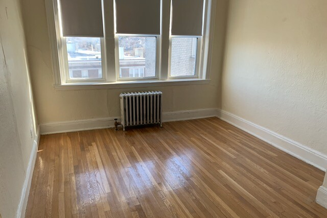 Visit hubrealtyproperties.com - Sunny 1 bedroom with fully applianced kitchen, upper floor, heat included, laundry on site