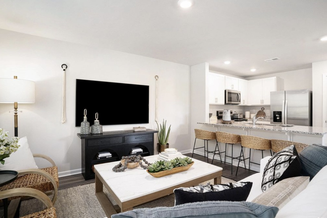 Living room - The Townes At Amber Bluff Townhome