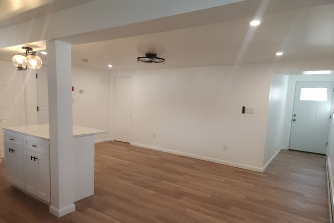 Living Room - Newly Renovated 1BR Apartment in Rocky Point Private Yard & In-Unit Laundry!