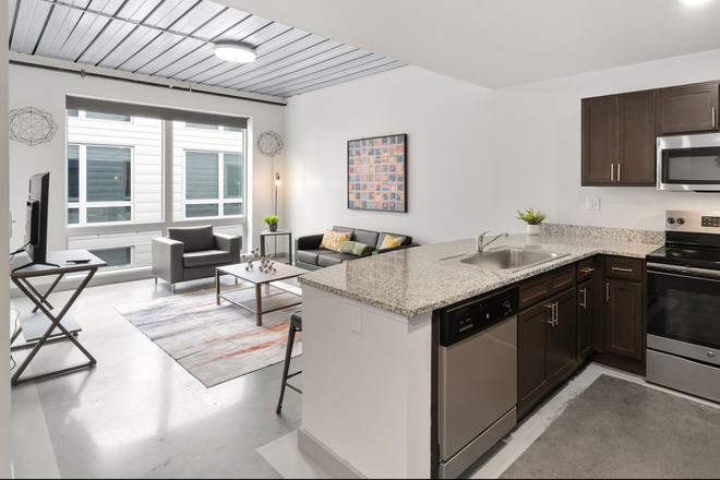 Kitchen/Living Room - SUBLET in four-person suite in Edge Merrimack River (one person) Apartments