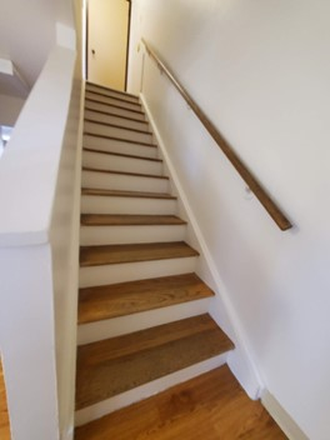 Stairs - Furnished Bedroom in Smiley Court Apartments