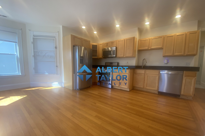 Kitchen/Living Area - Gorgeously Renovated 7 Bedroom near Campus!! Apartments