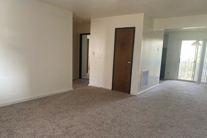 View of dining room and living room - Cypress Gardens Apartments