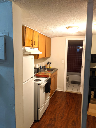 Visit hubrealtyproperties.com - Handy studio on basement level with full kitchen, close to Longwood Medical Area Apartments