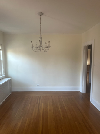 This is the dining room off of the family room. - Hyde Park 2 family, upper unit available, 4 bedroom/2 bath Duplex
