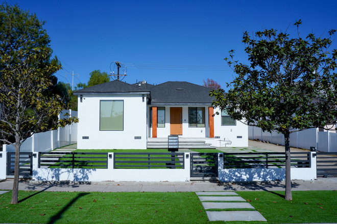Walk up your own gated entrance, and be immediately greeted with modern captivating hardscaping and green space oozing with curb appeal - Charming Studio
