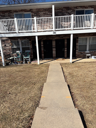 Walkway and front door - Vairo Village Apartments