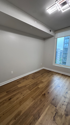 Master bedroom with a complete owner suite heated floor floors in the bathroom and a master closet - Luxury 2BR/2BA at The Pierce in Rosslyn – Minutes to Georgetown Condo