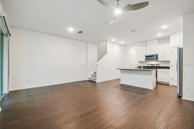 Living Room and Kitchen - Furnished New Townhome Gated Community