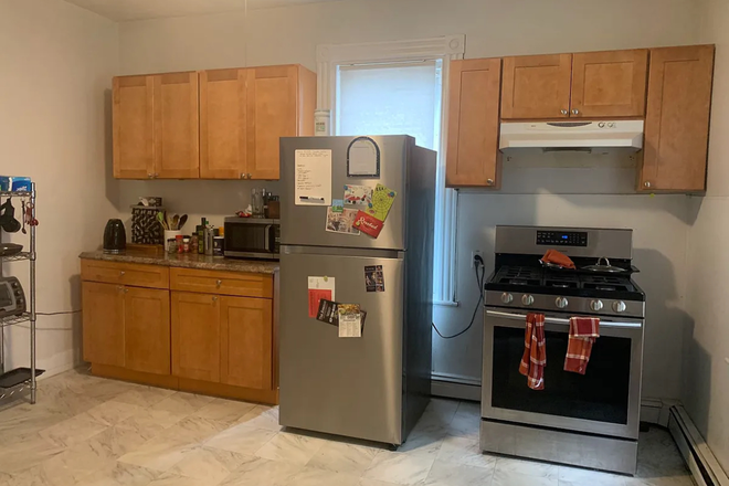 Kitchen - Avail Now! Bright 2BR 1st Floor Near Commuter Rail & Bus Lines - No Fee, $2600 Duplex