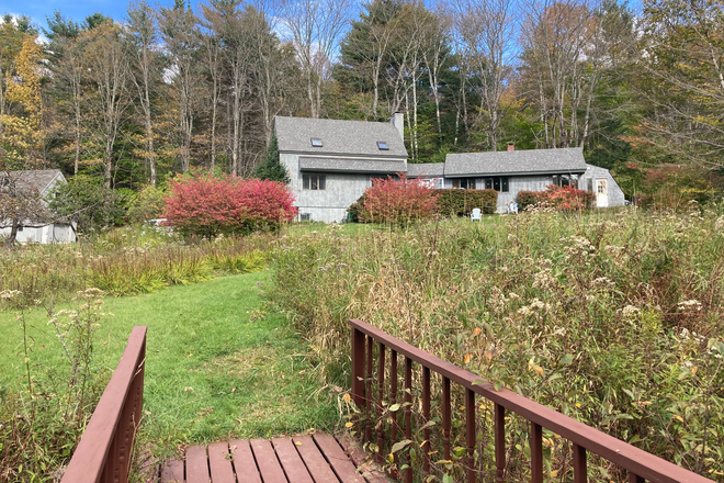 House from bridge to pond - Van Dusen House
