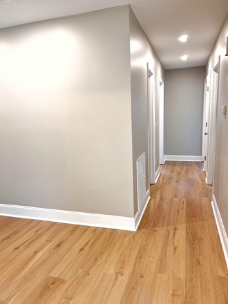 Hallway leading to bedrooms and 2 bathrooms - 3 Bedroom Home in the Heart of West Ashley