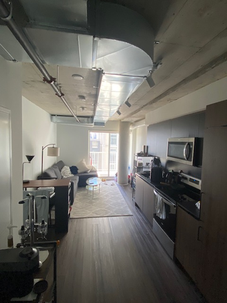 Living Room & Kitchen area - 2 Bedroom, 1 Bath with in-unit Laundry, Fully Furnished