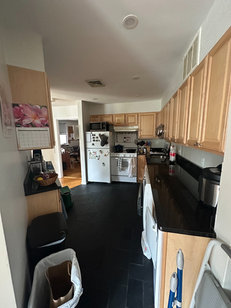kitchen - Sunny Riverway 2 bed/2 bath with in unit laundry Apartments