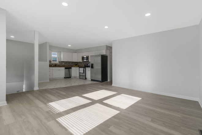 living/kitchen area - Spacious Off-Campus Living Near UMD – Renovated Rooms Starting at $850 House