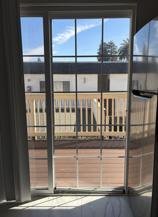 Sliding glass door in kitchen - North Berkeley Apt close to campus