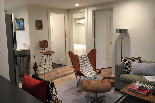 Living Room - Stylish, Fully Furnished 2-Bedroom Garage Apartment