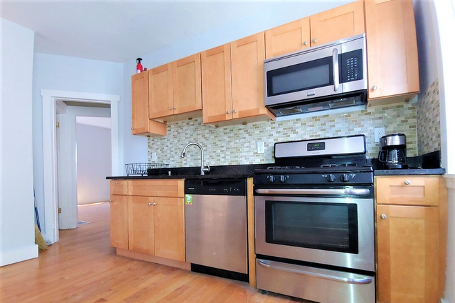 Renovated eat in kitchen - No fees! 2 last bedrooms available in our 4 bedroom apartment near Red Line