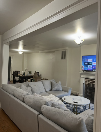 Common living room and dining space - Two Summer Sublet Rooms in Rowhouse! Walking Distance to Hopkins Homewood!