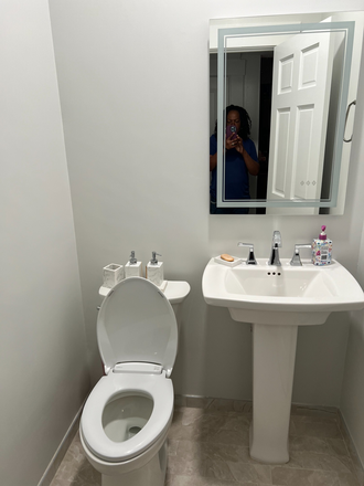 half bathroom on 1st floor - large furnished room in 2 family  house - 2nd floor