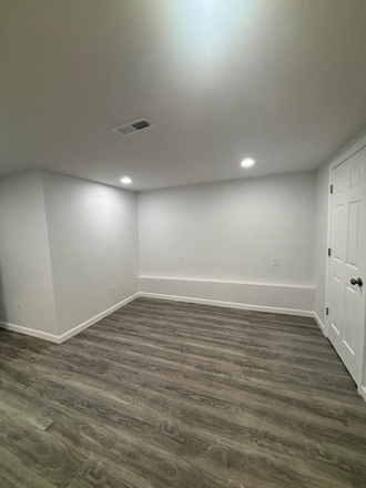 large bedroom with bath - Newly renovated modern 2-3 bedroom apartment New premium appliances AC 2 full baths Storage