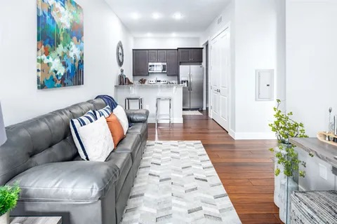 Living area with open kitchen - Keenan Court Flats