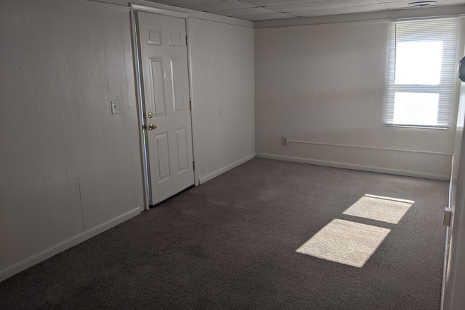 Living Room - 101 West Vine Street Apartments