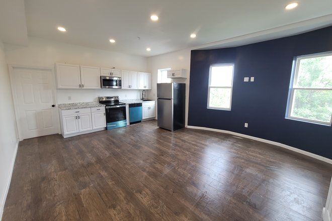Living space - Renovated 2-Bdrm W/Private Deck- utilities included