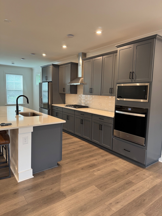 Kitchen - Modern 3 Bedroom Townhouse with EV Charger