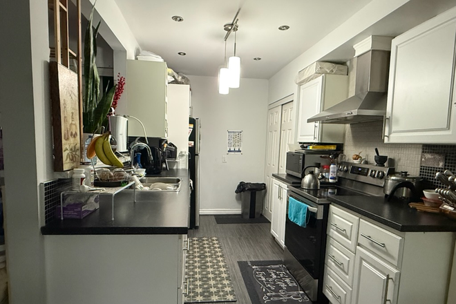 Kitchen area - Comfortable Room with Patio Access Townhome