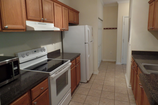 Kitchen - Concord West of The Ashley Apartments