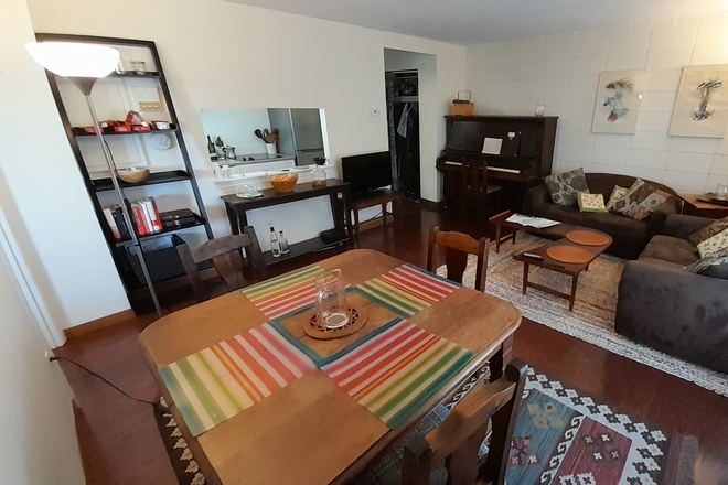 Living and dining room - charming, furnished, fantastic location, top floor, parking wifi utilities included, from owner Condo