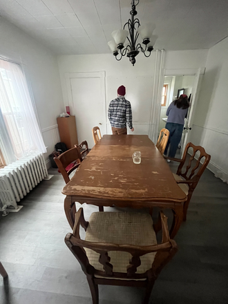 Dining room between living room and kitchen - Charming house with room available for 2026-2027 School Year