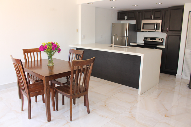 dining room - 2BR / 1.5BA Townhome in the Heart of Coconut Grove - Newly Renovated