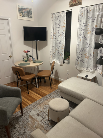 Living Room - Cute Apartment in Symphony, Looking for a female roomate to take over half of lease