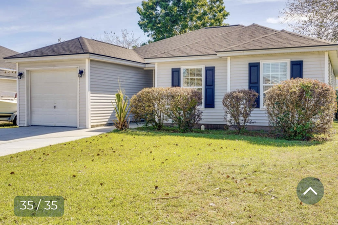 Home has outdoor security cameras and lighting - Welcoming Pet Friendly North Charleston home