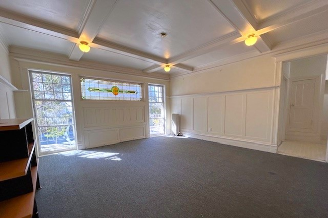9 - Spacious, Studio, One Bath Unit, above commercial shops, with Spacious Area with plenty of Natural