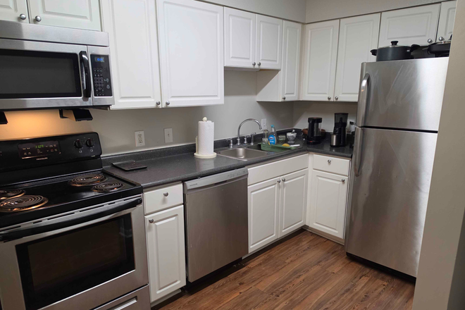 Kitchen - Carolina Apartments, 2-bed, 2-bath. Lease renewal with new roommate starting 7/15/26