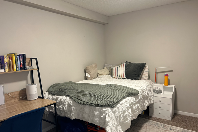 Bed and extra desk - University Park Apartments